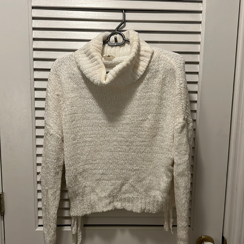 Cropped white turtleneck sweater